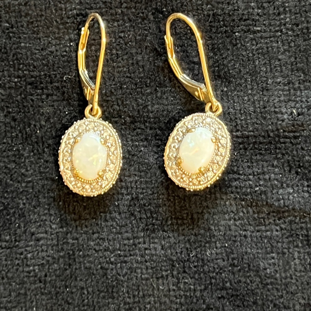 14kt yellow good, Opal and diamond earrings.